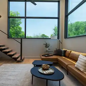 inviting Livingroom seating area with large windows