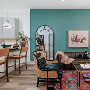 Living room adjecent to kitchen breakfast bar seating